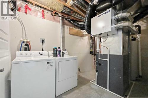 59 Redstone Park Ne, Calgary, AB - Indoor Photo Showing Laundry Room