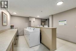 4 washers and dryers located on the 2nd floor - 