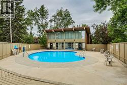 Outdoor pool and clubhouse close to the unit - 