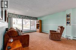 Large living room with new sliding doors to the ground level rear patio - 