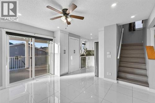 49 Taravista Way Ne, Calgary, AB - Indoor Photo Showing Other Room