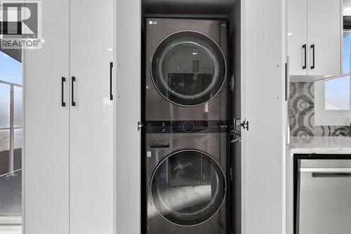 49 Taravista Way Ne, Calgary, AB - Indoor Photo Showing Laundry Room