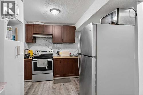 49 Taravista Way Ne, Calgary, AB - Indoor Photo Showing Kitchen