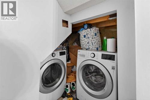 49 Taravista Way Ne, Calgary, AB - Indoor Photo Showing Laundry Room