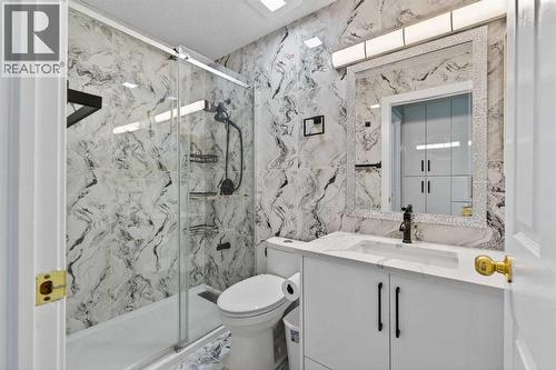 49 Taravista Way Ne, Calgary, AB - Indoor Photo Showing Bathroom