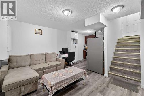 49 Taravista Way Ne, Calgary, AB - Indoor Photo Showing Living Room
