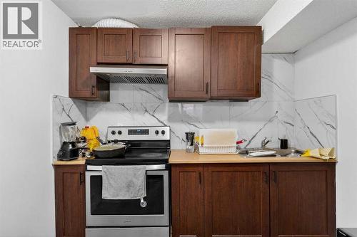 49 Taravista Way Ne, Calgary, AB - Indoor Photo Showing Kitchen