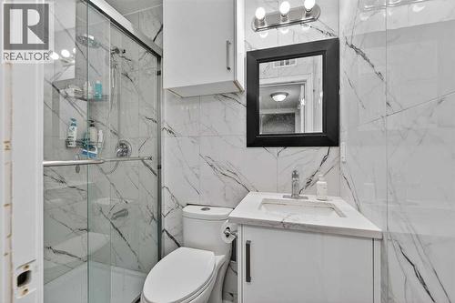 49 Taravista Way Ne, Calgary, AB - Indoor Photo Showing Bathroom