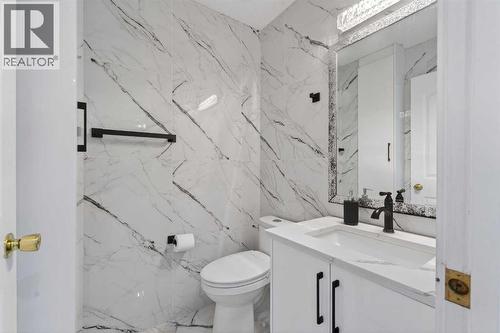 49 Taravista Way Ne, Calgary, AB - Indoor Photo Showing Bathroom