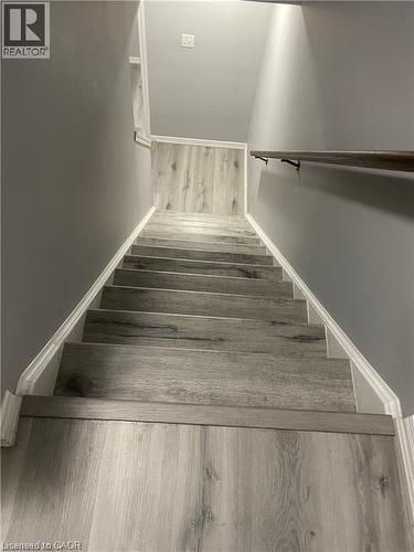 Stairway with hardwood / wood-style flooring - 198 Maitland Street, Kitchener, ON - Indoor Photo Showing Other Room