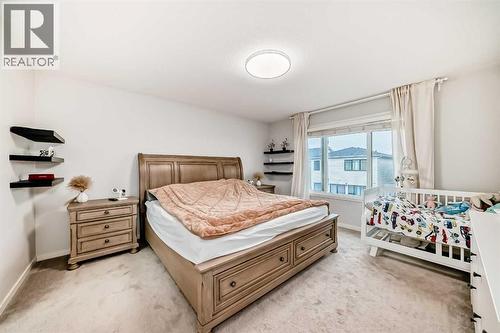 54 Seton Manor Se, Calgary, AB - Indoor Photo Showing Bedroom