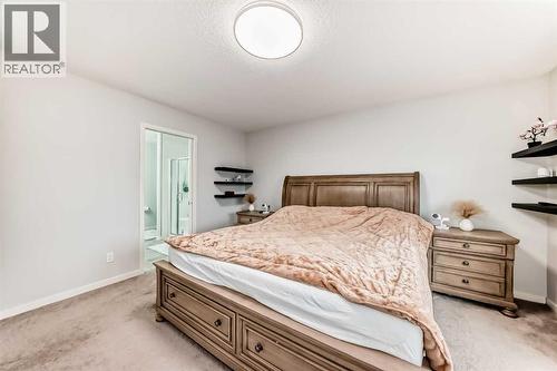 54 Seton Manor Se, Calgary, AB - Indoor Photo Showing Bedroom