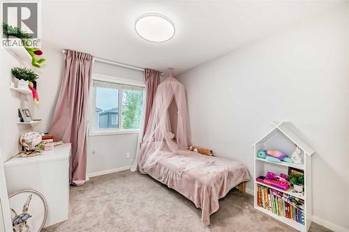 54 Seton Manor Se, Calgary, AB - Indoor Photo Showing Bedroom