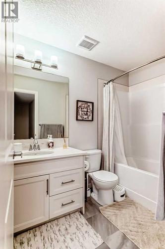 54 Seton Manor Se, Calgary, AB - Indoor Photo Showing Bathroom