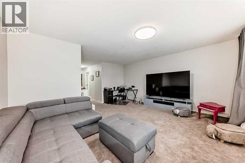 54 Seton Manor Se, Calgary, AB - Indoor Photo Showing Living Room