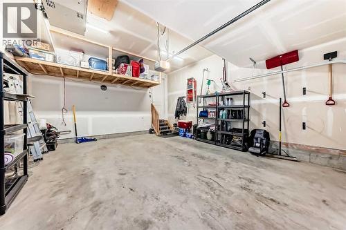 54 Seton Manor Se, Calgary, AB - Indoor Photo Showing Garage