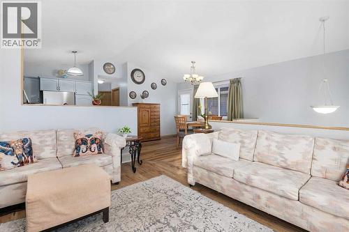 118 Bridleridge Way Sw, Calgary, AB - Indoor Photo Showing Living Room