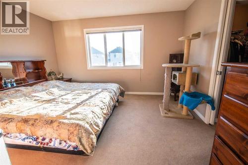 11 Saddlebrook Mews Ne, Calgary, AB - Indoor Photo Showing Bedroom
