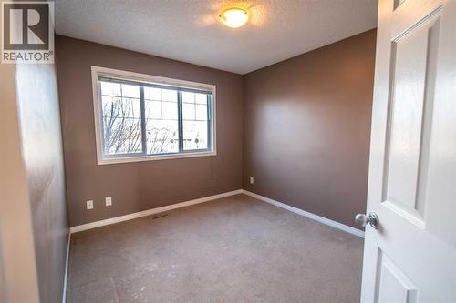 11 Saddlebrook Mews Ne, Calgary, AB - Indoor Photo Showing Other Room