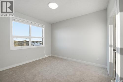 1303 101 Secord Way, Saskatoon, SK - Indoor Photo Showing Other Room