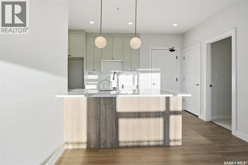 1303 101 Secord Way, Saskatoon, SK - Indoor Photo Showing Kitchen With Upgraded Kitchen