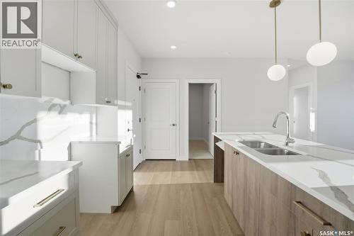 1303 101 Secord Way, Saskatoon, SK - Indoor Photo Showing Kitchen With Double Sink