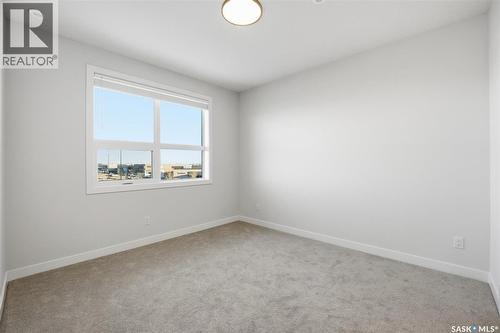 1304 101 Secord Way, Saskatoon, SK - Indoor Photo Showing Other Room