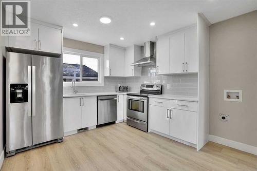 6060 Madigan Drive Ne, Calgary, AB - Indoor Photo Showing Kitchen With Upgraded Kitchen