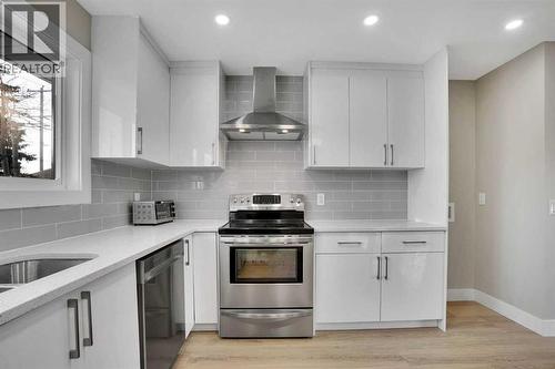 6060 Madigan Drive Ne, Calgary, AB - Indoor Photo Showing Kitchen With Upgraded Kitchen