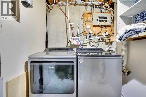 6060 Madigan Drive Ne, Calgary, AB - Indoor Photo Showing Laundry Room