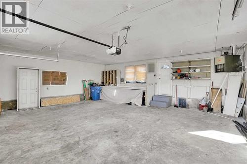 6060 Madigan Drive Ne, Calgary, AB - Indoor Photo Showing Garage