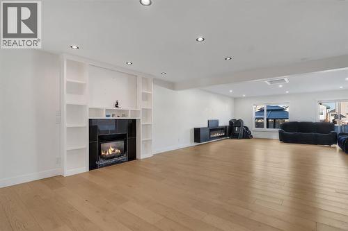 278 Saddlefield Place Ne, Calgary, AB - Indoor Photo Showing Living Room With Fireplace