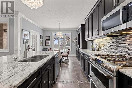 3383 Pioneer Parkway, London South (South V), ON - Indoor Photo Showing Kitchen With Double Sink With Upgraded Kitchen