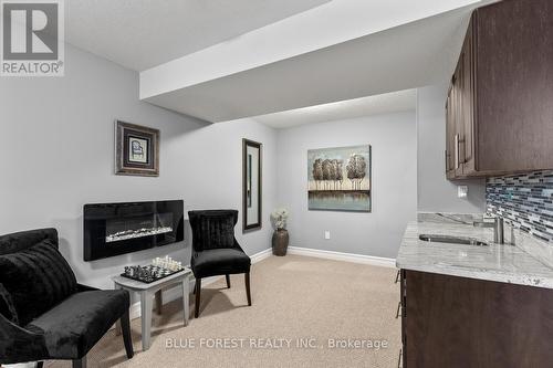 Lower level rec room - 3383 Pioneer Parkway, London South (South V), ON - Indoor With Fireplace