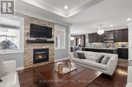 3383 Pioneer Parkway, London South (South V), ON - Indoor Photo Showing Living Room With Fireplace