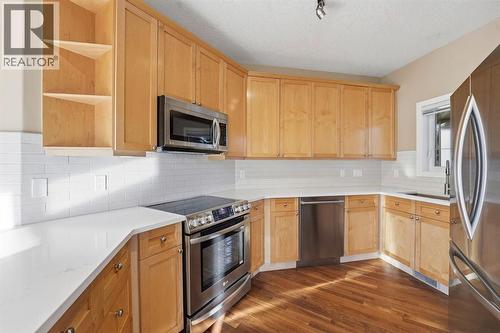 33 Prominence Park Sw, Calgary, AB - Indoor Photo Showing Kitchen With Stainless Steel Kitchen