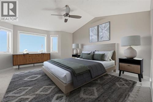 33 Prominence Park Sw, Calgary, AB - Indoor Photo Showing Bedroom