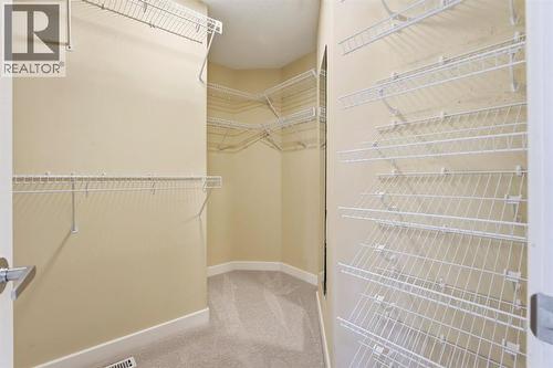 33 Prominence Park Sw, Calgary, AB - Indoor With Storage