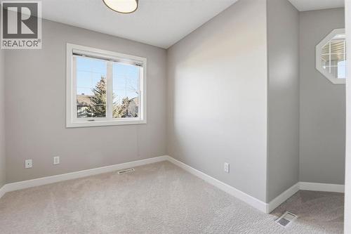 33 Prominence Park Sw, Calgary, AB - Indoor Photo Showing Other Room
