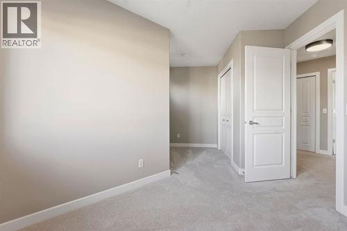 33 Prominence Park Sw, Calgary, AB - Indoor Photo Showing Other Room