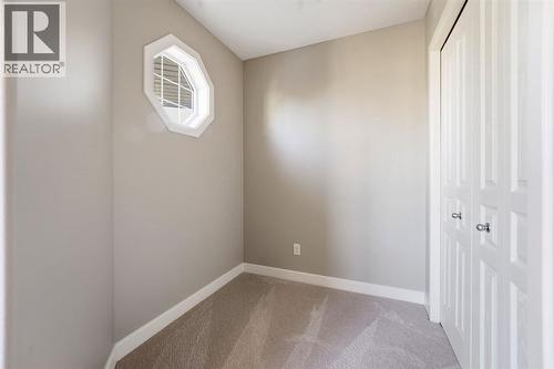 33 Prominence Park Sw, Calgary, AB - Indoor Photo Showing Other Room