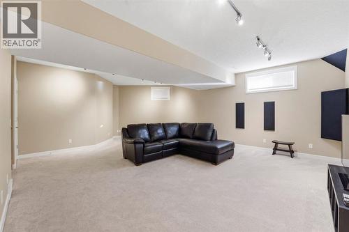 33 Prominence Park Sw, Calgary, AB - Indoor Photo Showing Basement