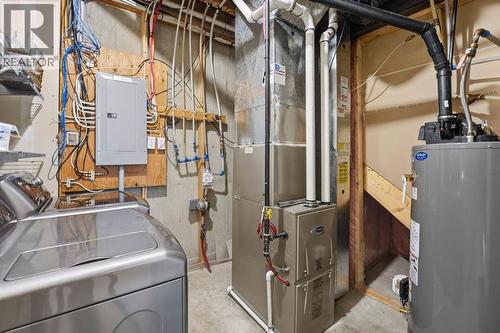 33 Prominence Park Sw, Calgary, AB - Indoor Photo Showing Basement