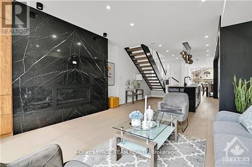 828 Alpine Avenue, Ottawa, ON - Indoor Photo Showing Living Room With Fireplace