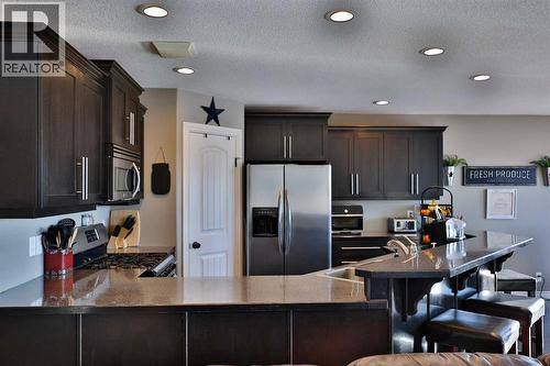 233073 Twp Rd 45, Spring Coulee, AB - Indoor Photo Showing Kitchen With Upgraded Kitchen