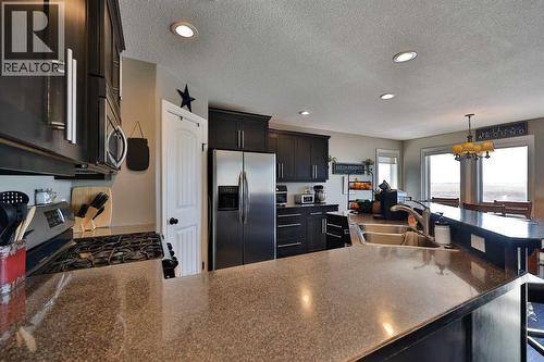 233073 Twp Rd 45, Spring Coulee, AB - Indoor Photo Showing Kitchen With Double Sink