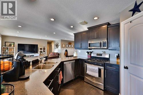233073 Twp Rd 45, Spring Coulee, AB - Indoor Photo Showing Kitchen With Double Sink