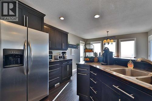 233073 Twp Rd 45, Spring Coulee, AB - Indoor Photo Showing Kitchen With Double Sink