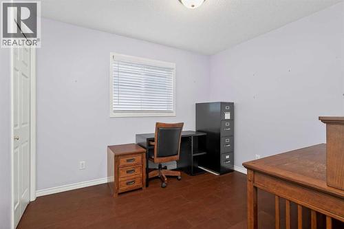 25 Westfall Drive, Okotoks, AB - Indoor Photo Showing Office