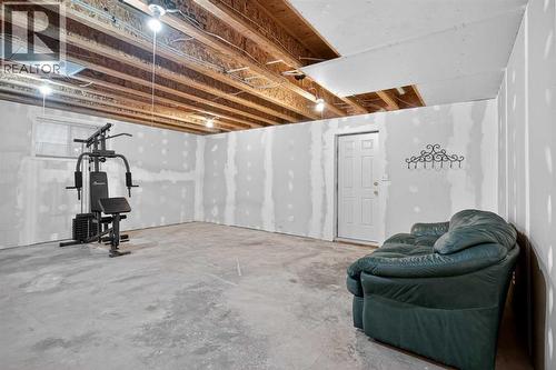 25 Westfall Drive, Okotoks, AB - Indoor Photo Showing Basement